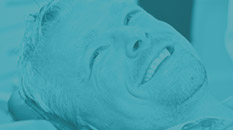 Blue green square with dental implant services